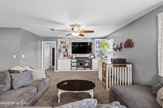 2264 Pebble Point Dr, Green Cove Springs, FL 32043 - carpeted living room featuring a ceiling fan and built in shelves