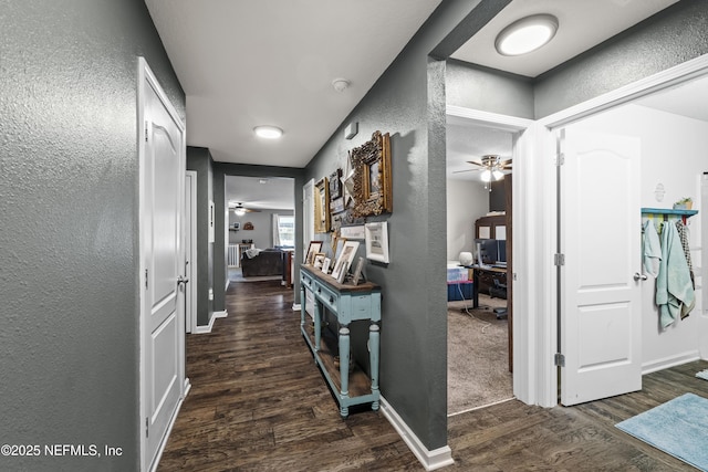 2264 Pebble Point Dr, Green Cove Springs, FL 32043 - corridor featuring a textured wall, wood finished floors, and a desk