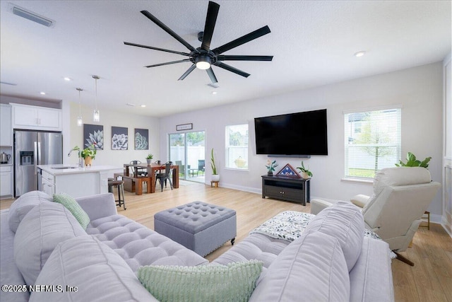 143 Dahlia Falls Dr, Saint Johns, FL 32259 - living room featuring light wood-type flooring, ceiling fan, and recessed lighting