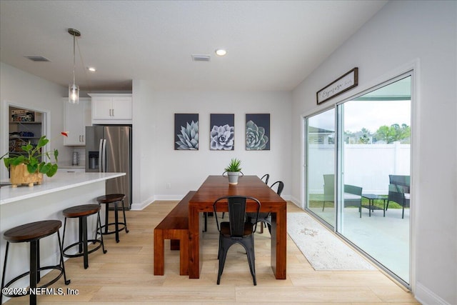 143 Dahlia Falls Dr, Saint Johns, FL 32259 - dining area featuring light wood-type flooring and recessed lighting