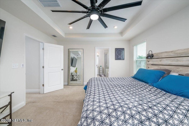 143 Dahlia Falls Dr, Saint Johns, FL 32259 - bedroom with a tray ceiling, carpet floors, ensuite bath, and recessed lighting