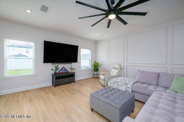 143 Dahlia Falls Dr, Saint Johns, FL 32259 - living room with a decorative wall, light wood-type flooring, a ceiling fan, and recessed lighting