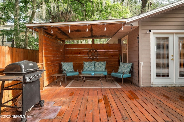 122 Twine St, Saint Augustine, FL 32084 - wooden deck featuring grilling area, an outdoor hangout area, and french doors