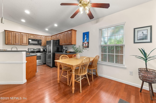 122 Twine St, Saint Augustine, FL 32084 - dining room featuring wood finished floors, recessed lighting, ceiling fan, and lofted ceiling