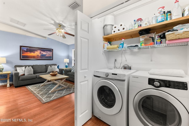 122 Twine St, Saint Augustine, FL 32084 - washroom with washer and dryer, light wood-style flooring, and a ceiling fan