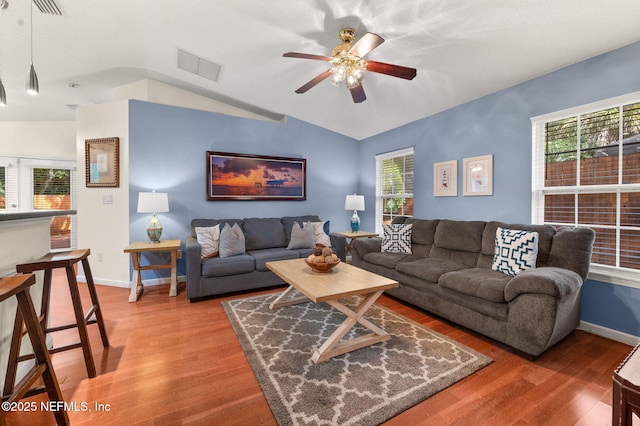 122 Twine St, Saint Augustine, FL 32084 - living room with lofted ceiling, ceiling fan, and wood finished floors