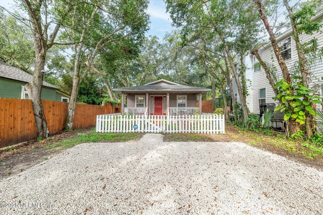 122 Twine St, Saint Augustine, FL 32084 - view of front of property with a porch and a fenced front yard