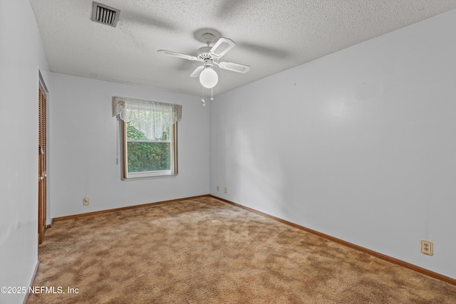 1083 Kings Rd, Neptune Beach, FL 32266 - carpeted spare room with a ceiling fan and a textured ceiling
