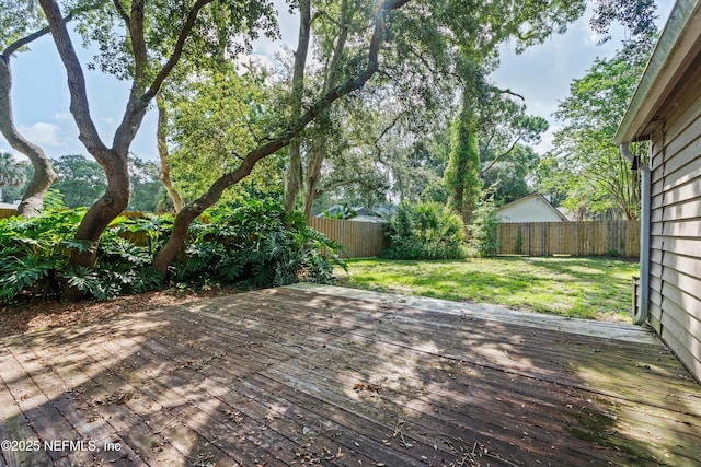 1083 Kings Rd, Neptune Beach, FL 32266 - wooden terrace with a fenced backyard