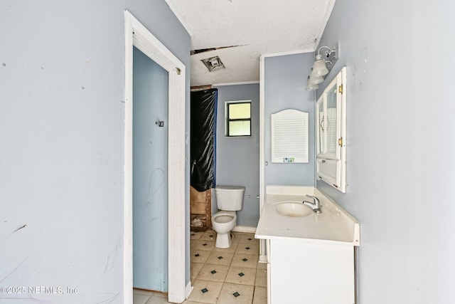 2259 Marlee Rd S, Jacksonville, FL 32259 - bathroom with vanity, crown molding, a textured ceiling, and tile patterned floors