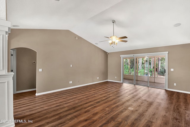 1994 Protection Pt, Fleming Island, FL 32003 - empty room featuring a ceiling fan, lofted ceiling, arched walkways, and dark wood-style flooring