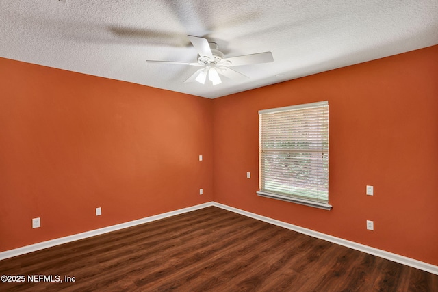1994 Protection Pt, Fleming Island, FL 32003 - unfurnished room featuring dark wood-style flooring, ceiling fan, and a textured ceiling