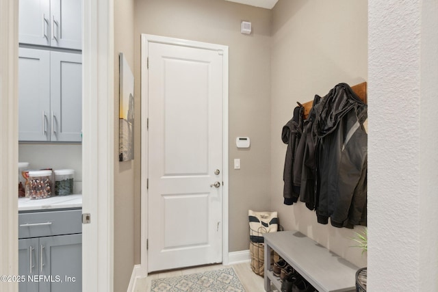 95196 Golden Glow Dr, Fernandina Beach, FL 32034 - mudroom with baseboards and light wood-type flooring