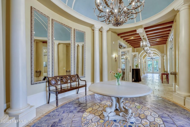 95196 Golden Glow Dr, Fernandina Beach, FL 32034 - entrance foyer with decorative columns, a chandelier, and beam ceiling