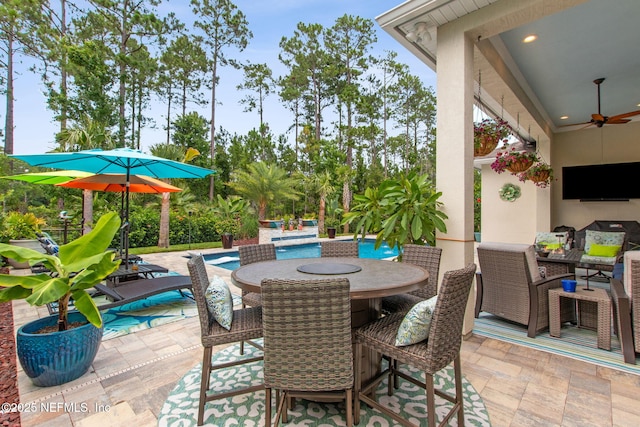 95196 Golden Glow Dr, Fernandina Beach, FL 32034 - view of patio / terrace featuring outdoor dining area, an outdoor pool, and a ceiling fan