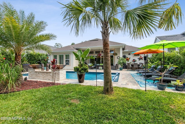95196 Golden Glow Dr, Fernandina Beach, FL 32034 - outdoor pool with an outdoor hangout area, a yard, and a patio area