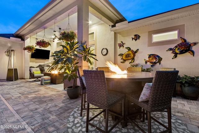95196 Golden Glow Dr, Fernandina Beach, FL 32034 - view of patio featuring a fire pit