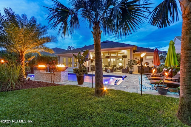 95196 Golden Glow Dr, Fernandina Beach, FL 32034 - outdoor pool featuring a lawn and a patio