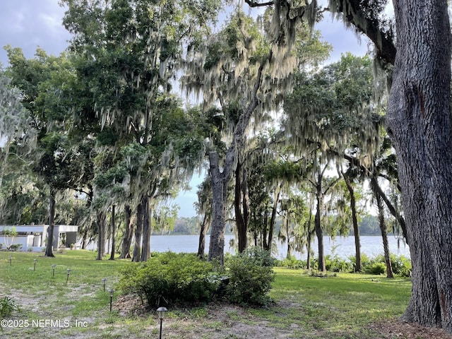 2664 SW 14th Dr Unit 325, Gainesville, FL 32608 - surrounding community featuring a water view and a lawn