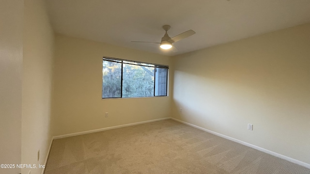 2664 SW 14th Dr Unit 325, Gainesville, FL 32608 - empty room featuring a ceiling fan and light carpet