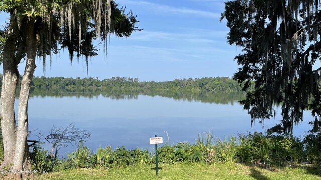 2664 SW 14th Dr Unit 325, Gainesville, FL 32608 - water view featuring a heavily wooded area