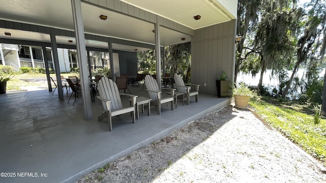 2664 SW 14th Dr Unit 325, Gainesville, FL 32608 - view of patio / terrace featuring outdoor dining space