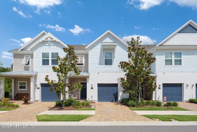 30 Yeti Ct, Saint Augustine, FL 32092 - townhome / multi-family property featuring decorative driveway and a garage