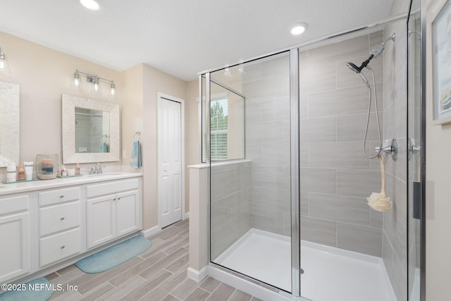 30 Yeti Ct, Saint Augustine, FL 32092 - full bath with a shower stall, vanity, wood tiled floors, and recessed lighting