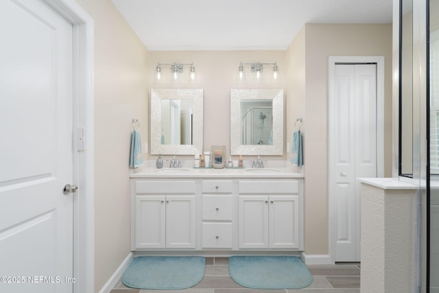 30 Yeti Ct, Saint Augustine, FL 32092 - bathroom with double vanity, an enclosed shower, and wood finished floors
