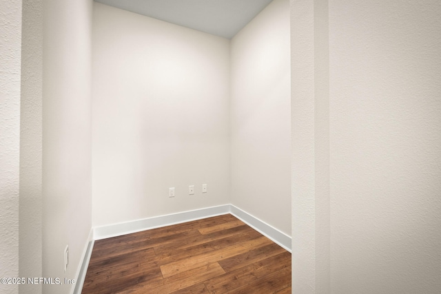 36250 Pitch Ln, Hilliard, FL 32046 - unfurnished room featuring dark wood finished floors and baseboards