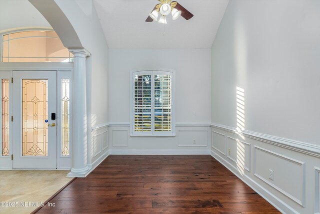 1700 Southcreek Dr, Saint Johns, FL 32259 - entryway featuring ornate columns, wood-type flooring, arched walkways, ceiling fan, and wainscoting