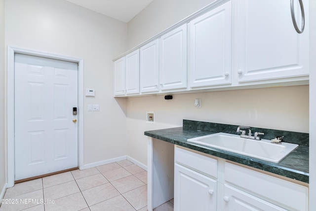 1700 Southcreek Dr, Saint Johns, FL 32259 - laundry area with hookup for a washing machine, cabinet space, and light tile patterned floors