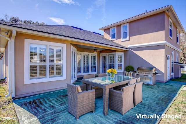 1700 Southcreek Dr, Saint Johns, FL 32259 - wooden deck with area for grilling, a ceiling fan, and outdoor dining space