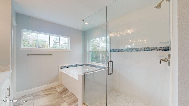 99 Sloganeer Trl, Palm Coast, FL 32164 - bathroom with a bath, a shower stall, vanity, and marble finish flooring