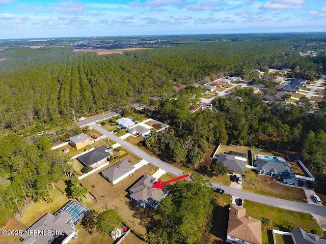99 Sloganeer Trl, Palm Coast, FL 32164 - aerial view of property and surrounding area with nearby suburban area