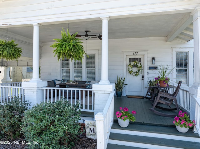 117 Parshley St SW, Live Oak, FL 32064 - view of exterior entry featuring a porch and a ceiling fan