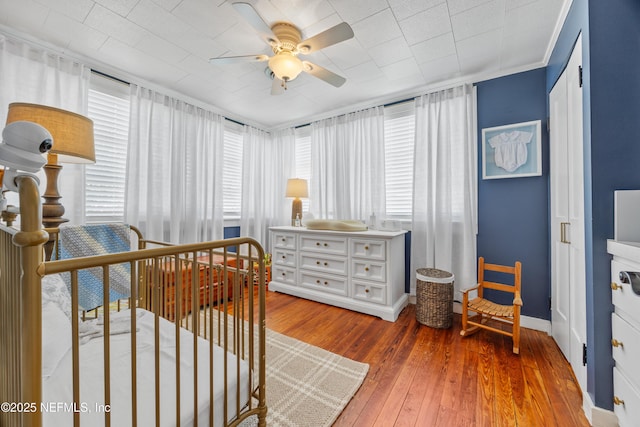 117 Parshley St SW, Live Oak, FL 32064 - bedroom featuring hardwood / wood-style floors and baseboards