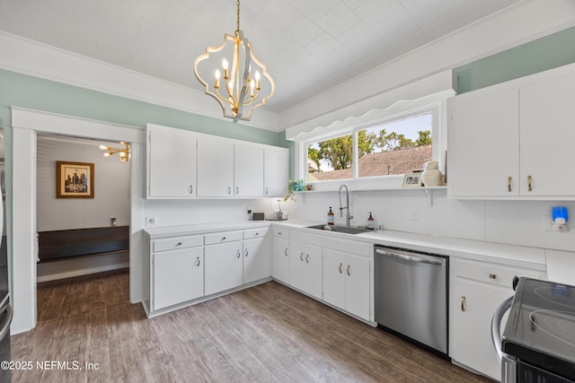117 Parshley St SW, Live Oak, FL 32064 - kitchen featuring dishwasher, a chandelier, range with electric cooktop, light countertops, and white cabinets