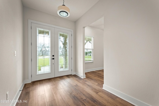 36258 Pitch Ln, Hilliard, FL 32046 - foyer entrance featuring french doors and hardwood / wood-style flooring
