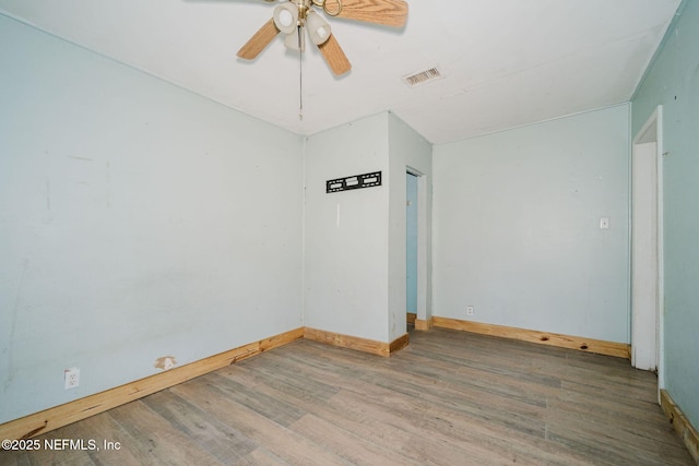14344 68th St, Live Oak, FL 32060 - unfurnished room with wood finished floors and a ceiling fan