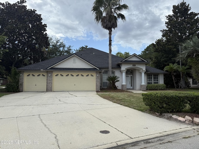 1032 Durbin Parke Dr, Jacksonville, FL 32259 - view of front of house with a garage, concrete driveway, and stucco siding