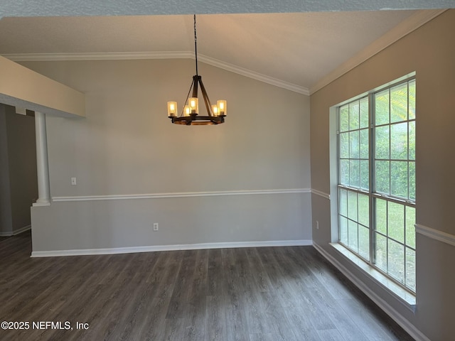 1032 Durbin Parke Dr, Jacksonville, FL 32259 - unfurnished room with vaulted ceiling, plenty of natural light, a chandelier, dark wood-style flooring, and crown molding
