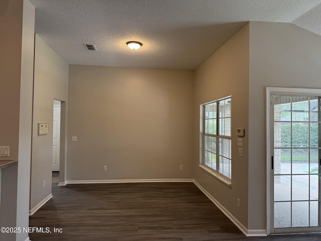 1032 Durbin Parke Dr, Jacksonville, FL 32259 - unfurnished room featuring dark wood finished floors, a textured ceiling, and plenty of natural light