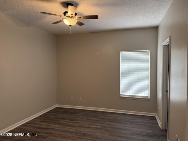 1032 Durbin Parke Dr, Jacksonville, FL 32259 - empty room featuring dark wood-style flooring, a textured ceiling, and a ceiling fan