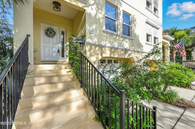 2201 Windjammer Ln, Saint Augustine, FL 32084 - property entrance with stucco siding