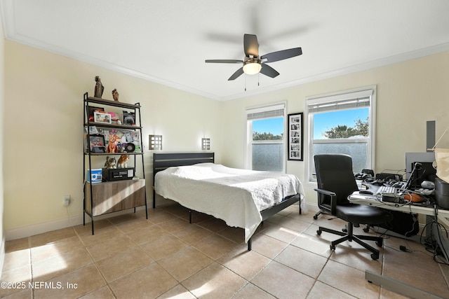 2201 Windjammer Ln, Saint Augustine, FL 32084 - bedroom featuring crown molding, an office area, light tile patterned floors, and a ceiling fan