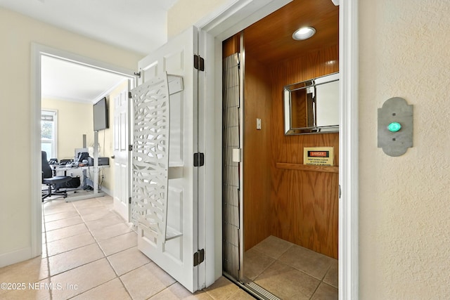 2201 Windjammer Ln, Saint Augustine, FL 32084 - hall featuring an office area, light tile patterned floors, and a textured wall