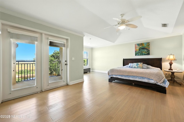 2201 Windjammer Ln, Saint Augustine, FL 32084 - bedroom featuring access to outside, ornamental molding, wood finished floors, vaulted ceiling, and ceiling fan