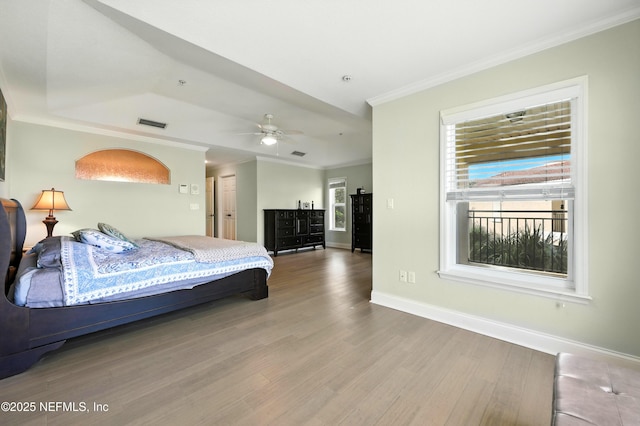 2201 Windjammer Ln, Saint Augustine, FL 32084 - bedroom with wood finished floors and ornamental molding
