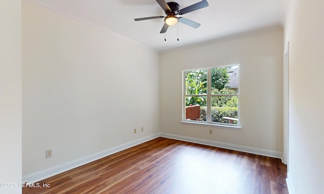 1877 Medinah Ln, Green Cove Springs, FL 32043 - spare room with dark wood-type flooring, ornamental molding, and ceiling fan